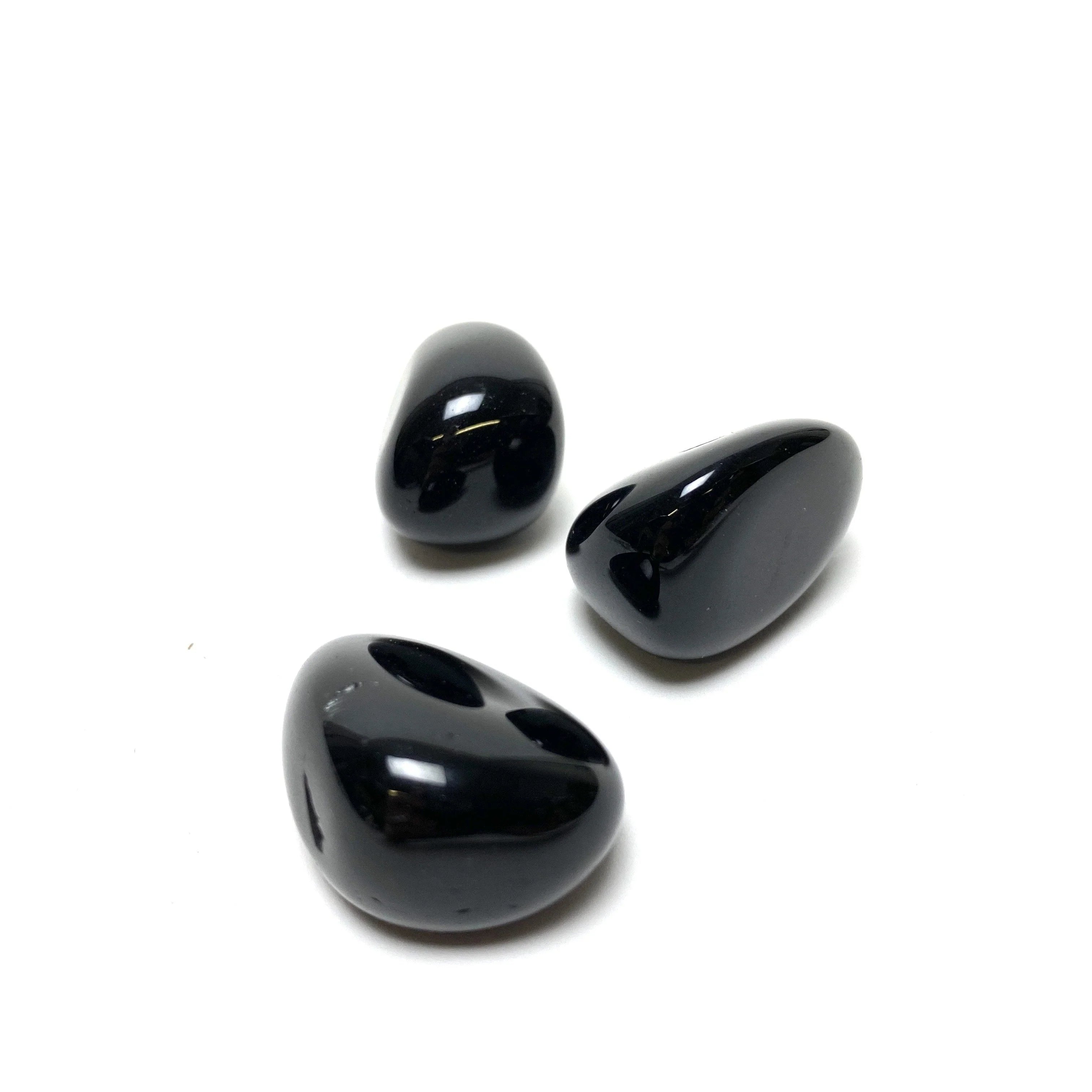 Natural Black Obsidian crystals for emotional stability and energy cleansing.