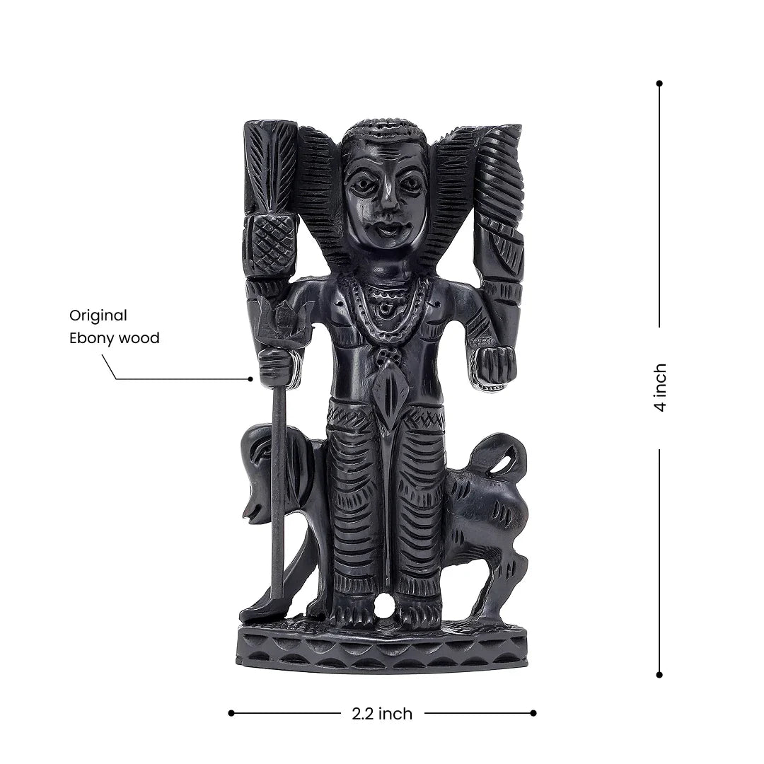 Bhairava statue made from ebony wood, 4 inches high and 2.2 inches wide, featuring the dog.