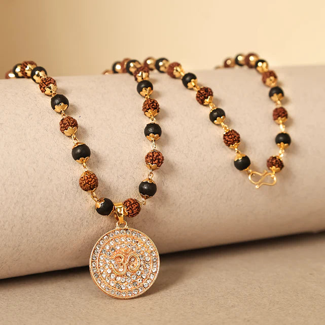 Rudraksha Karungali Malai in Gold-Cap with Om Pendant 54B